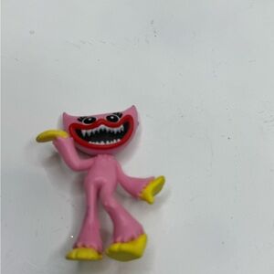 Pink and Yellow Monster Toy Figure